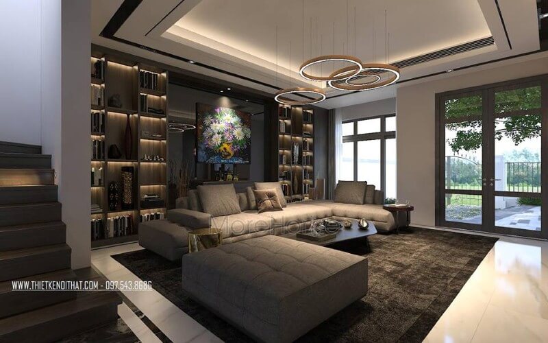 Trang trí nội thất phòng khách ấn tượng với phong cách hiện đại sang trọng cùng sắc trầm chủ đạo. Thiết kế phòng khách nhà phố